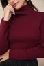 Pull col roulé
